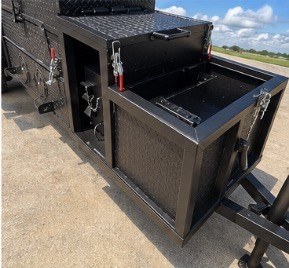 Diamond plate storage boxes with lids open