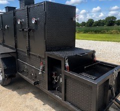 Rear view of the smoker showing chambers and side boxes